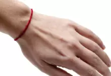 Как да носим червен конец